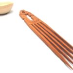 A gourd bowl and a comb